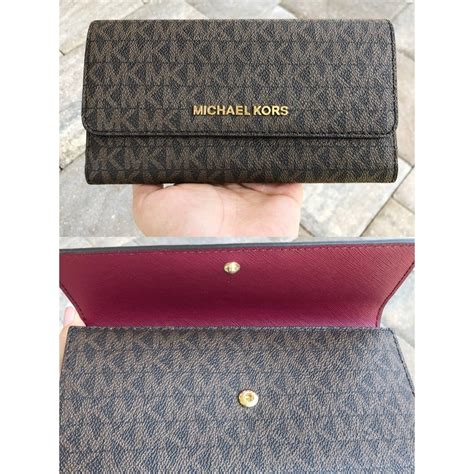 michael kors logo large wallet|Michael Kors oversized wallet.